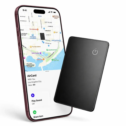 Black AirCard wallet tracker beside a Burgundy iPhone showing its location in Find My.